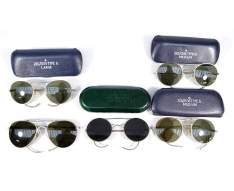 Four pairs of vintage military issue aviator type sunglasses; type 22G with military broad arrows to both glasses and case, t