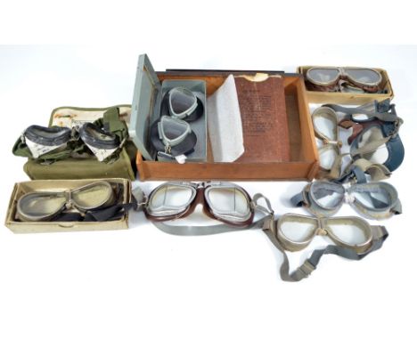 A collection of vintage flying and other goggles including a canvas cased pair of anti-mine military issue examples, etc (9).