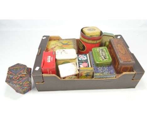A collection of vintage tins to include Wilkinson's Pontefract Cakes, Huntley & Palmer's Biscuits, etc. 