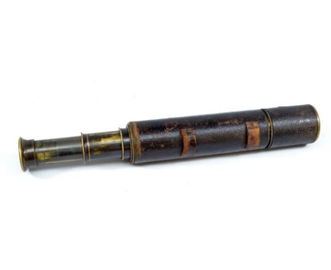 An unnamed 1.5" brass four-draw telescope inscribed 'N.S.L Y1461', with delineated section to the primary lens and stitched l