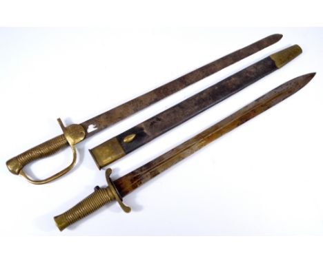 A late 19th century brass gripped bayonet with push button action and leather scabbard and a further brass bayonet, stamped M