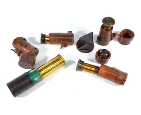 DOLLAND OF LONDON; a brass single-draw monocular, five various lenses and a prism (7).