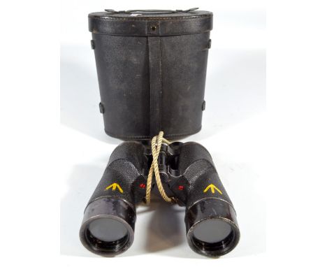 A pair of military issue binoculars inscribed 'C.G.B. 40MA 7x50, 25577-C, Patt.2/1900, Rel/Canada 1945', with numerous broad 