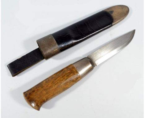 A small hunting knife with wooden grip and shaped blade within a leather and 925 grade silver mounted scabbard, overall lengt