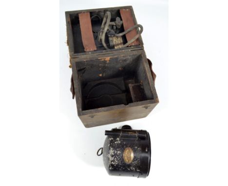 A cased Lucas of Birmingham signalling long range daylight electric signalling lamp.