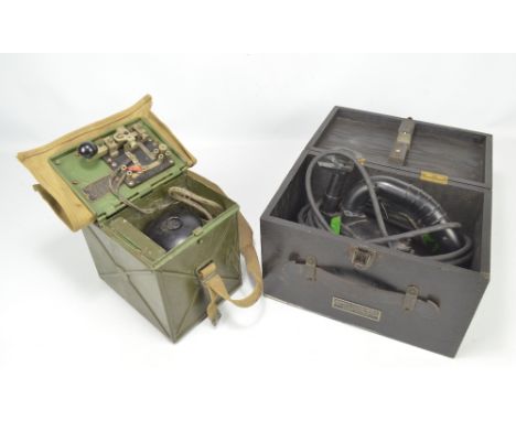 A cased WWII period daylight short range signalling lamp, no. A27615, the lamp and case both stamped 1941, also to include a 