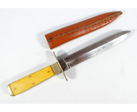 An IXL knife with ivory faced grip and shaped blade, inscribed 'C Wostenholm & Son, Ashington Works, IXL', in associated simp