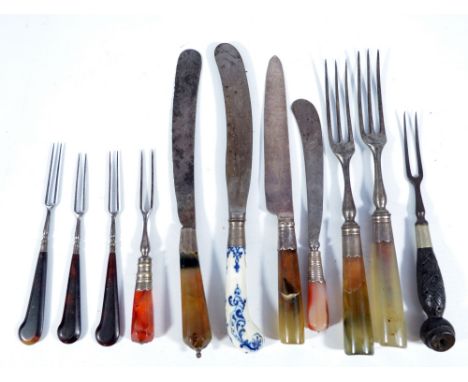 Two agate handled three tine forks, two similar knives, a small knife and two tine fork with agate handles, three small torto