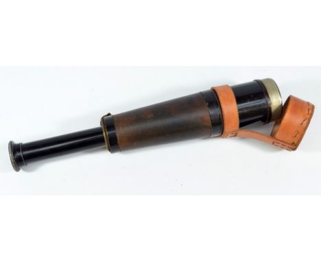A FRANKS LTD OF MANCHESTER; a 2.25" black lacquered brass three-draw telescope with associated leather end cap, length 27.5cm