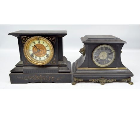 Two late 19th century French black slate mantel clocks, one with Ansonia Clock Co movement, the second with silvered Roman nu