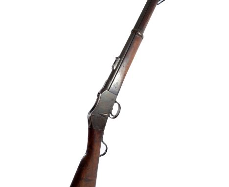 An 1877 Enfield Martini action 2-band carbine rifle, the lock plate inscribed 'V.R. Enfield 1877', length 96cm (barrel cut). 
