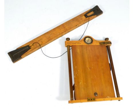 A military issue boxwood and beech Major Verner's patent arm mounted map roll with compass and projector, also a military iss