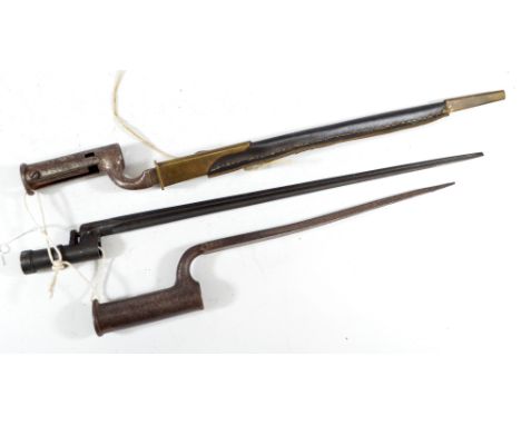 Three socket bayonets, one with associated scabbard (3). CONDITION REPORT: PLEASE NOTE: we are unable to post this lot using 