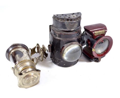 Three vintage lamps; Dolan & Co of London 'The Crescent Lamp', a Miller example with moulded glass side panels with lighthous