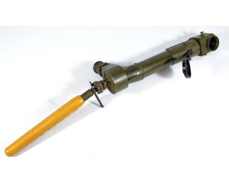 BECK; a green painted periscope with wooden handle inscribed 'No.14 TPL. MK47, O.S. 1427, G.A., R&J.B. 9738', length 71cm.