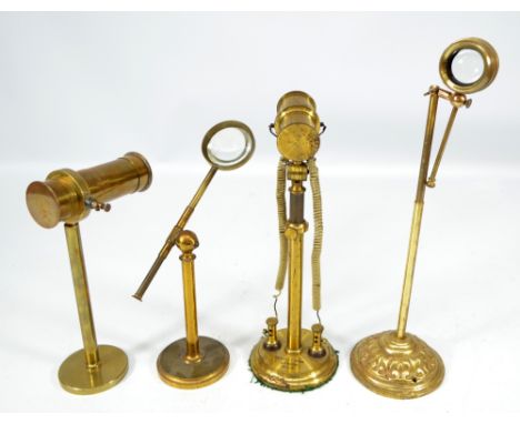 Two brass scientific instruments, one stamped 'Elliott Bros, London No. 329' and two brass hinged free standing magnifying gl