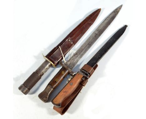 Three various bayonets, one with scabbard, one with associated scabbard inscribed 'Baldock Knife Spear made expressly for Wal