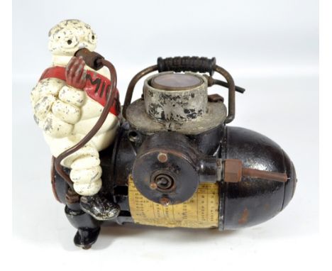 MICHELIN; an early compressor, set with Mr Bibendum on the inflation barrel, the cap inscribed 'R. Toussaint & Cie, Paris-Rho