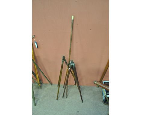 A WWI issue oak and brass divided folding tripod, the mount inscribed 'SIG.TEL.STAND Mark V No22988' and 'Blunt & Wray London