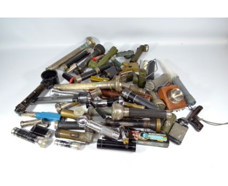 A very large collection of vintage torches, some military related, etc.