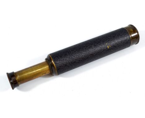 NEWBOLD & BULFORD LTD OF LONDON; a 'Falcon 22X' 1" brass three-draw telescope, length 17.5cm.