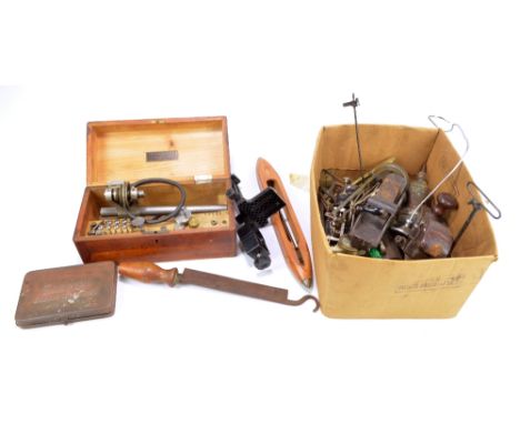 A boxed part complete Clerkenwell watch/clock maker's lathe and a quantity of further tools including two planes, vices, clam