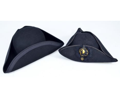 Two black tricorn hats, one with interior silk lining and gilt manufacturer's stamp 'Finest Quality Best Manufacture Made In 