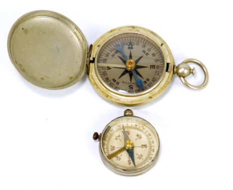 A WWII period US Army pocket compass by Wittnauer, stamped 'U.S.' to cover, also a further smaller example stamped 'Stesco Fo