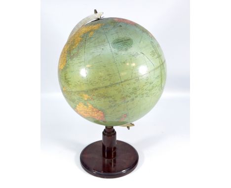 A Philips 1920/30s 13.5" globe raised on stained beech circular plinth, height 53cm (lacking compass to base).