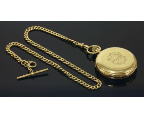 An 18ct gold hunter pocket watch,Russells Ltd., Liverpool, suspended on an 18ct gold Albert chain.  The side wind pocket watc