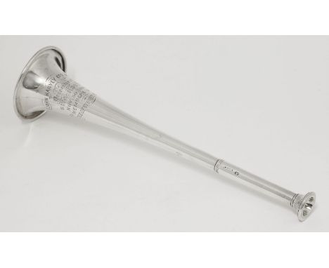A Victorian silver hunting horn,by William Summers, London 1864,of usual form, inscribed ‘John Harvey Esq MFH, Presented at S