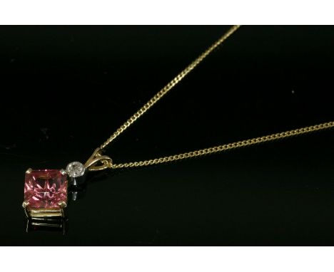 An 18ct yellow and white gold pink tourmaline and diamond pendant,with a square cut corner pink tourmaline four claw set in a