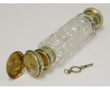 A Victorian novelty silver gilt mounted cut glass double scent bottle/fob watch,unmarked c.1865, of typical form with two spr