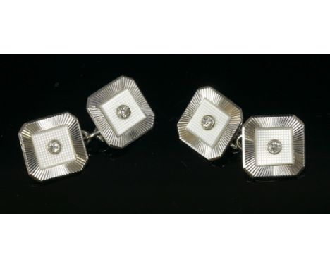 A pair of white gold, mother-of-pearl and diamond set chain-link cufflinks,with square cut corner plates.  Each plate with an