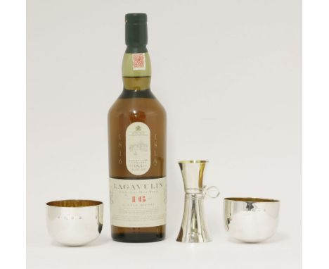 A Garrard & Co. presentation Malt Whisky set, London 1995/6,containing a 70cl bottle of Lagavulin single Islay malt whisky, a