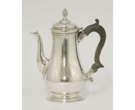 A George III small silver coffee pot,by William Shaw & William Preist, London 1761,of baluster form on spreading circular foo