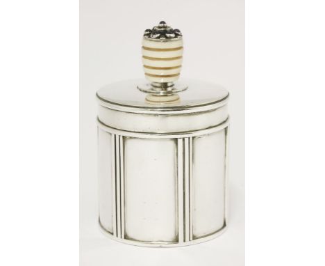 A silver cigarette box,by H G Murphy, London 1931,with the Falcon studio mark, of cylindrical form, applied with wirework geo