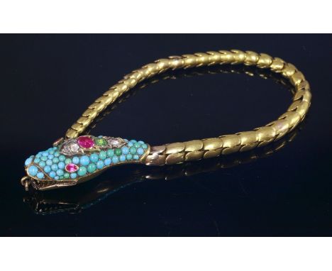 A Victorian turquoise and gem set gold snake or serpent bracelet, c.1850,the head pavé set with graduated turquoise cabochons