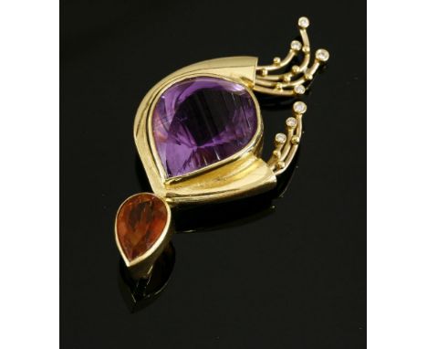 An 18ct gold amethyst, citrine and diamond pendant by Catherine Best c.2005,a pear shaped citrine, rub set to form a conceale