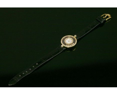 A ladies 18ct gold Chopard 'Happy Diamond' Icon quartz strap watch,circular case, 24mm diameter, white dial, gold hands and d