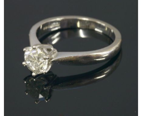 An 18ct white gold single stone diamond ring,with a brilliant cut diamond, estimated as approximately 0.85ct, six claw set to