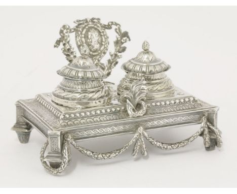 A 19th century silver inkstand,with import hallmarks, London 1891,of rectangular form on four angular feet with swag pendants