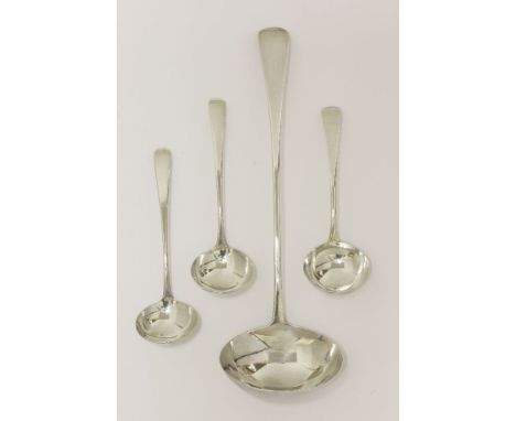A collection of four George III silver old english pattern serving pieces, comprising:a soup ladle,by Solomon Hougham, London