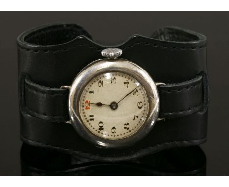 A gentleman's sterling silver WWI period Rolex mechanical strap watch,with a W&D case, 29mm diameter, silvered dial, black nu
