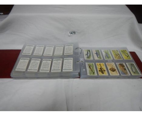 An album of pre WW2 cigarette cards including Player's and Will's
