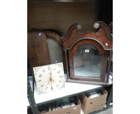 A quantity of Victorian long case clock parts, a hood, 3 hood doors, 1 case door & a 30 hour square movement (All A/F)
