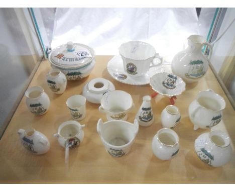 19 pieces of Uppingham School crested china, mostly Goss including marmalade pot, Worcester jug & Kohl pot etc