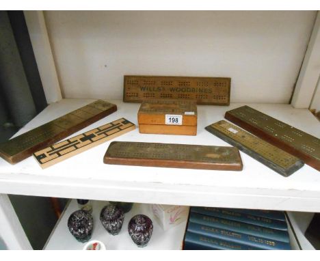 4 brass & 3 wood (Wills Woodbines) cribbage boards