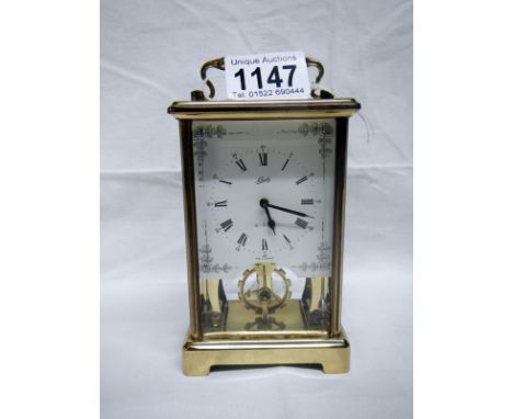 A brass Schatz carriage clock
