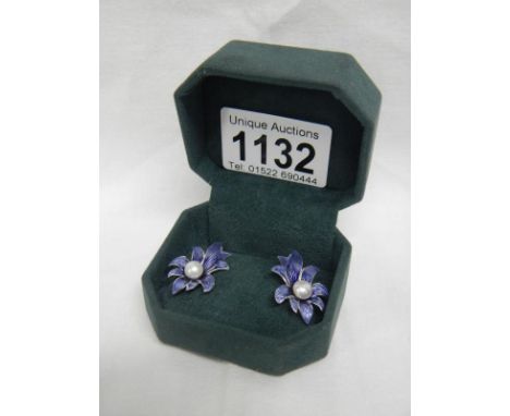 A pair of enamel earrings set with cultured pearls
